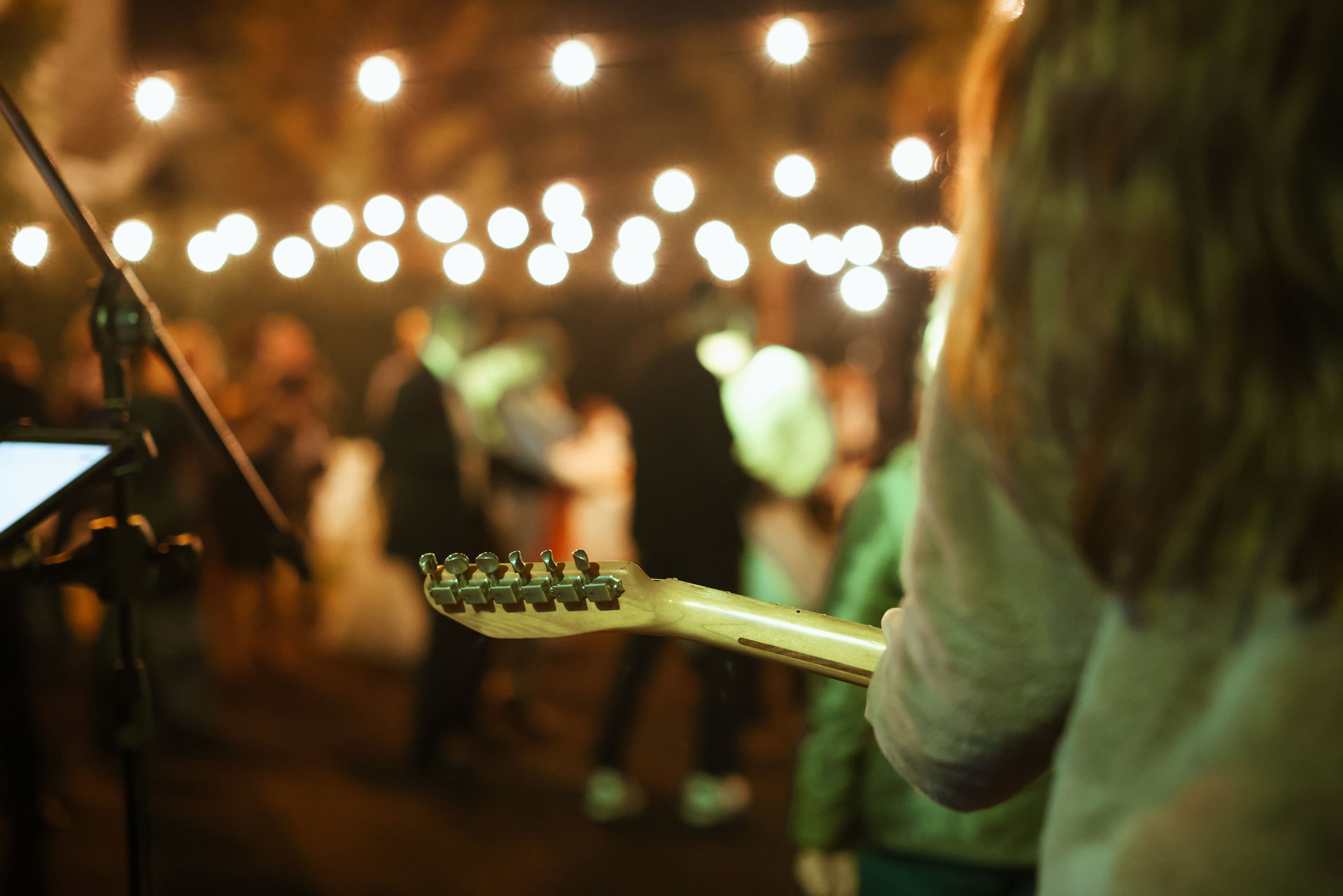 Guitarist on stage for background, soft and blur concept